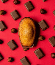 Load image into Gallery viewer, Madeleine - Milk chocolate hazelnut shell
