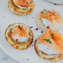 Load image into Gallery viewer, Mini Blinis smoked Salmon 12 Pcs
